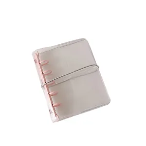 Clear PVC 3-ring binder for nail art storage with pink clips and elastic band