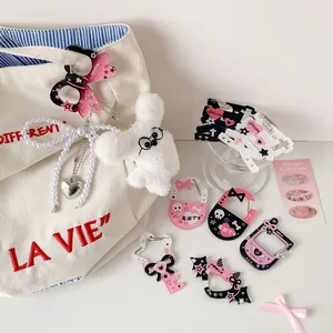 Kawaii Goth acrylic carabiners in pink and black heart, bat, and bow shapes for bags