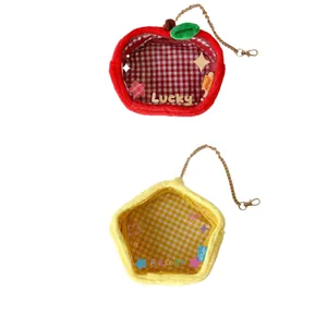 Star and apple shaped plush pouches with clear windows for doll storage and display