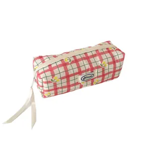 Red plaid pencil case with cherry patterns and hi socute ribbon zipper on white background