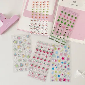 Detailed view of 3D crystal epoxy stickers set featuring strawberry and clover patterns