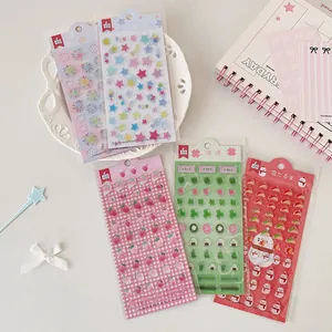 Detailed view of 3D epoxy resin strawberry stickers for DIY scrapbooking decoration