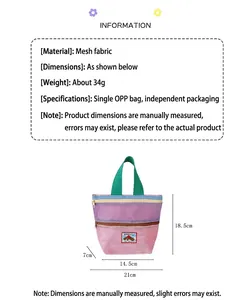 Detailed view of color-block mesh bag with dog patch, size 18.5x14.5x7cm for beach storage