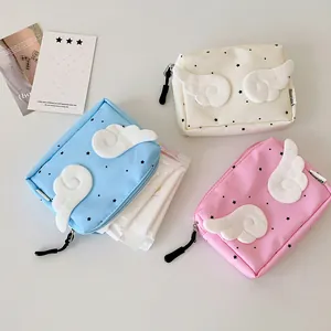 Detailed view of mini canvas storage bags with cute angel wings and starry patterns
