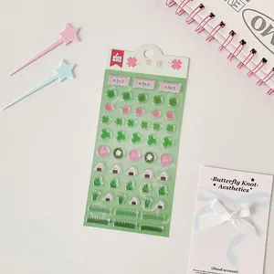 3D bubble stickers featuring clover and cherry blossom patterns for DIY scrapbooking