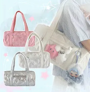 Three colors of Korean style quilted cross-body bags featuring transparent window and bow charms