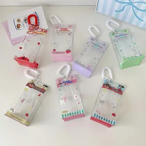 Multiple colorful transparent PVC doll storage pouches with cute cartoon fruit prints