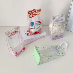 Close-up of clear PVC doll display pouches with cute strawberry and apple prints