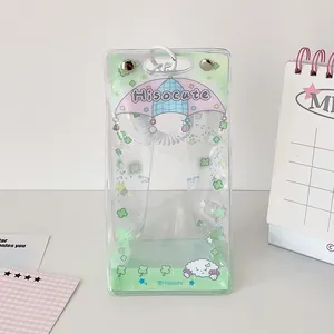 Detailed view of clear PVC plush doll display bag with cute cartoon prints and metal buckles