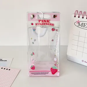Detailed view of the strawberry themed transparent PVC storage bag with pink accents