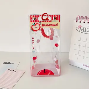 Clear PVC doll display bag with red apple motif, spring coil hook, and snap closure