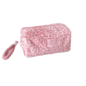 Pink leopard print plush cosmetic bag with zipper and fluffy wristlet strap