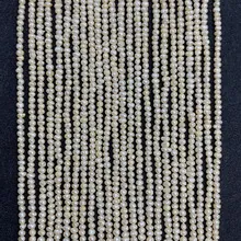 Macro detail of natural freshwater white seed pearls in irregular round shapes for DIY jewelry