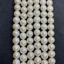 Detail of 8-10mm white freshwater pearls with high luster for DIY jewelry making