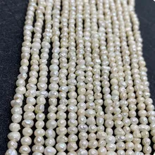 Macro detail of natural freshwater baroque pearls in milky white for jewelry DIY crafting