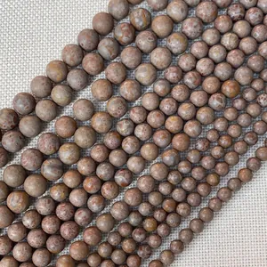 Natural stone round beads for jewelry making in various sizes with spotted texture