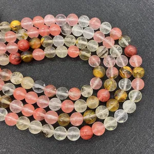Macro shot of polished natural multi-color crystal beads with unique inclusions and texture