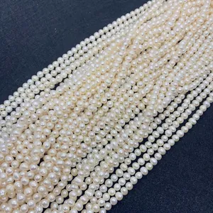 Close-up of high-luster cream freshwater pearls in multiple strands for jewelry making