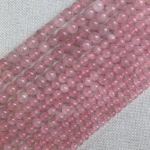 Natuurlijke ronde rozenkwarts kristallen kralen met doorschijnende textuur voor DIY sieraden