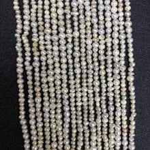 Macro detail of natural freshwater baroque pearls in strings for DIY jewelry making