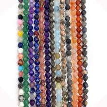 Close-up of faceted natural gemstone beads in various colors for DIY jewelry making