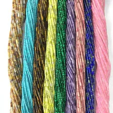 Macro view of colorful faceted cylinder natural stone heishi beads for DIY jewelry making