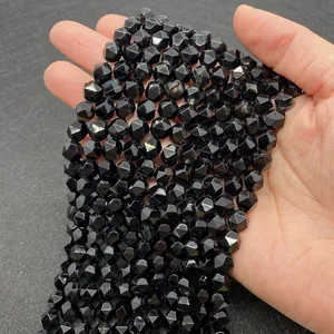 Close-up of faceted black agate natural stone beads for DIY jewelry making