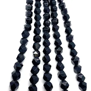 Detailed view of faceted black onyx round beads for DIY jewelry making and craft projects