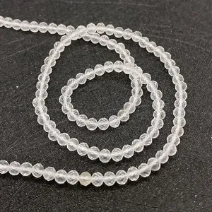 Detailed macro view of faceted clear quartz crystal beads for DIY jewelry making