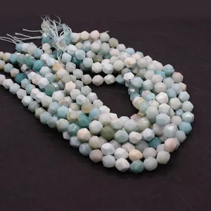 Macro view of faceted natural Amazonite stone beads on strings for jewelry making