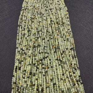 Macro detail of natural faceted prehnite green gemstone beads for jewelry making