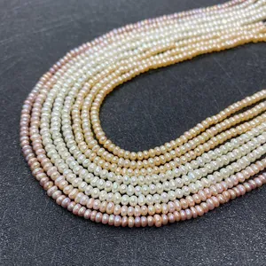 Grade A freshwater pearl strands in white pink purple and gold 2-4mm flat round pearls