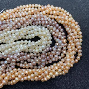 Strands of white, pink, and purple freshwater pearls for DIY jewelry making