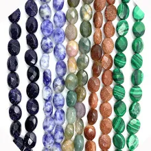 Close-up of faceted oval semi-precious stone beads for DIY jewelry making in multiple colors