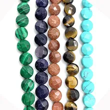 Detailed faceted flat round beads in malachite, blue sand, tiger eye and turquoise stone