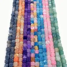 Macro detail of colorful cube-shaped cracked agate stone beads for DIY jewelry making