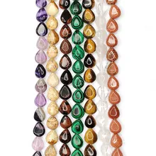 Macro shot of assorted colorful teardrop gemstones for DIY jewelry making
