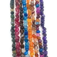 Vertical rows of colorful irregular gemstone beads for DIY jewelry and crafts