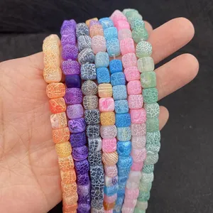 Macro view of colorful cube-shaped weathered agate beads with unique crackle patterns
