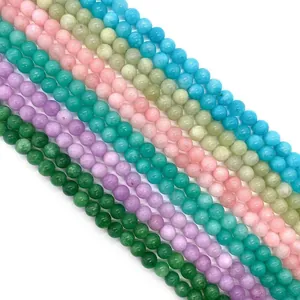 Polished colorful natural stone beads in pink blue green and purple for jewelry making