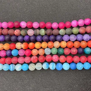 Close-up of colorful frosted dragon vein agate loose beads for DIY jewelry making