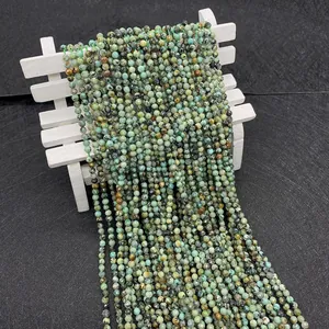 Macro detail of faceted African turquoise beads showing natural textures and green hues