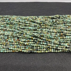 Detailed macro view of faceted natural African turquoise round beads for DIY jewelry