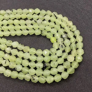 Macro shot of natural green prehnite faceted beads for jewelry making