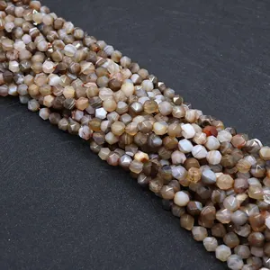Detailed macro view of faceted striped agate beads for DIY necklace jewelry making