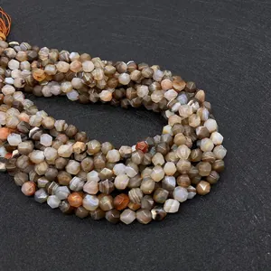 Close-up of faceted striped agate beads showing natural textures and polished surfaces