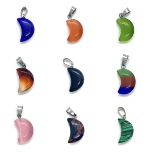 Macro display of nine multi-colored crescent moon stone pendants with silver metal clasps