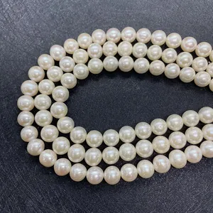 Macro shot of high-quality AAA grade white natural freshwater pearls in rows