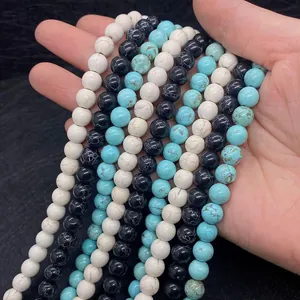 Detailed view of 8mm round natural stone beads in white, blue, and black for DIY jewelry