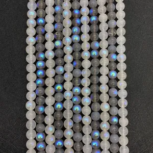 Macro detail of blue sheen iridescent moonstone beads strands for DIY jewelry making